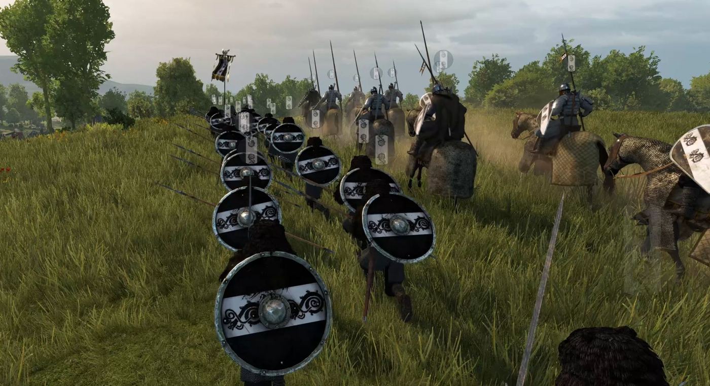 Infantry and cavalry advancing over a hill